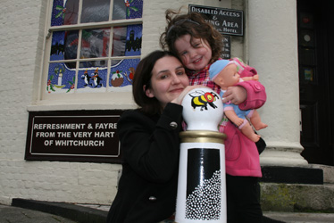 Julie Moss & daughter Liberty show off painted pub bollards at Whit Hart Whitchurch.jpg